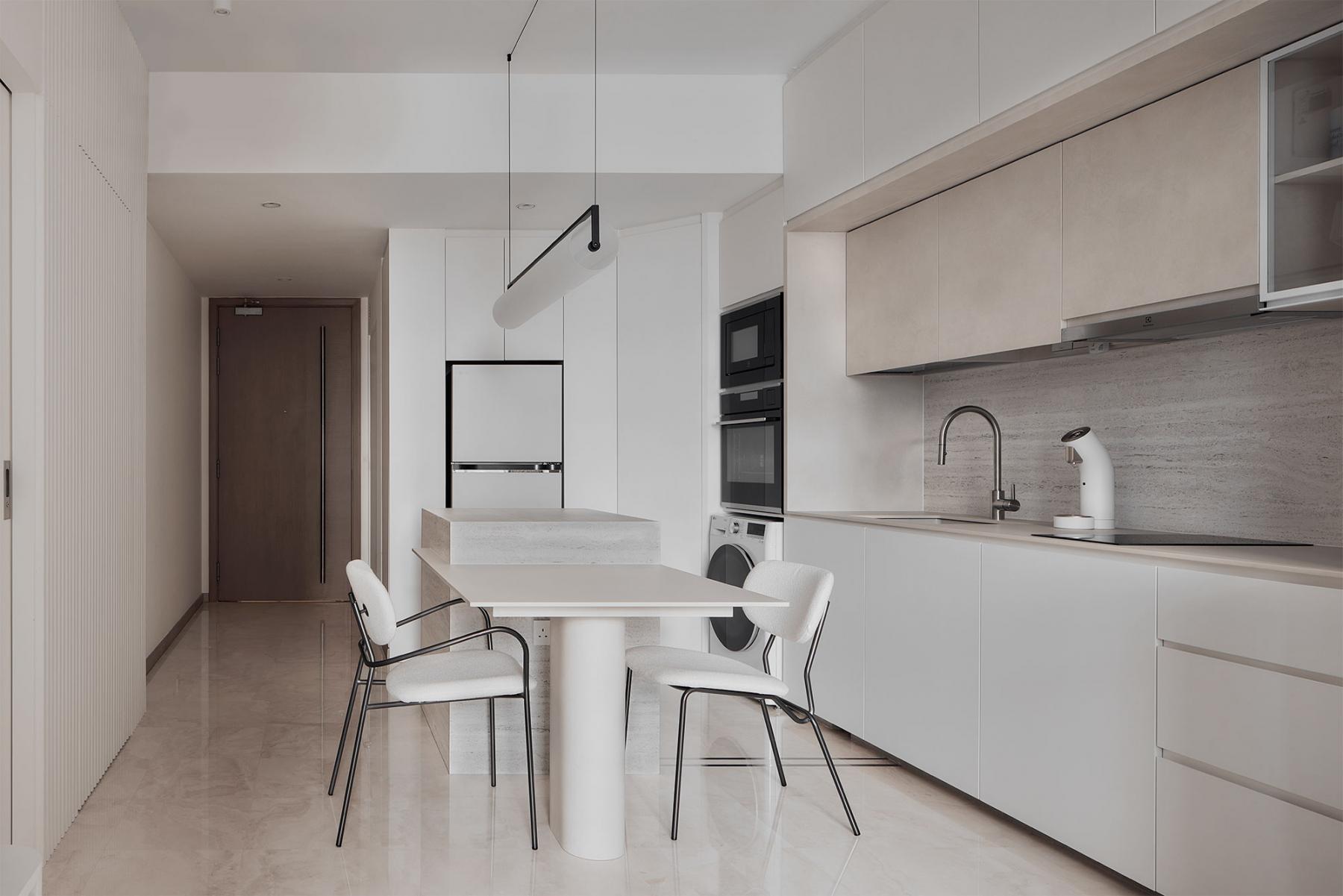 Minimalist Kitchen with Herringbone Tiling and Marble Floor