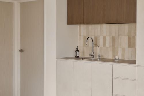Minimalist Kitchen at 685 Race Course