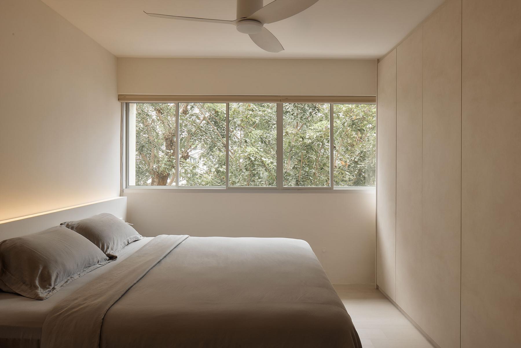 Minimalist Bedroom with Granite Floor and Drop Ceiling