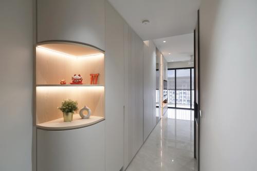 Contemporary Entryway at 3 Bedroom Condo @ Sengkang Grand Residence