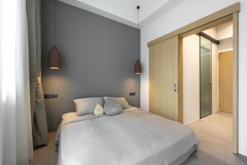 Contemporary Bedroom at Boathouse Residence