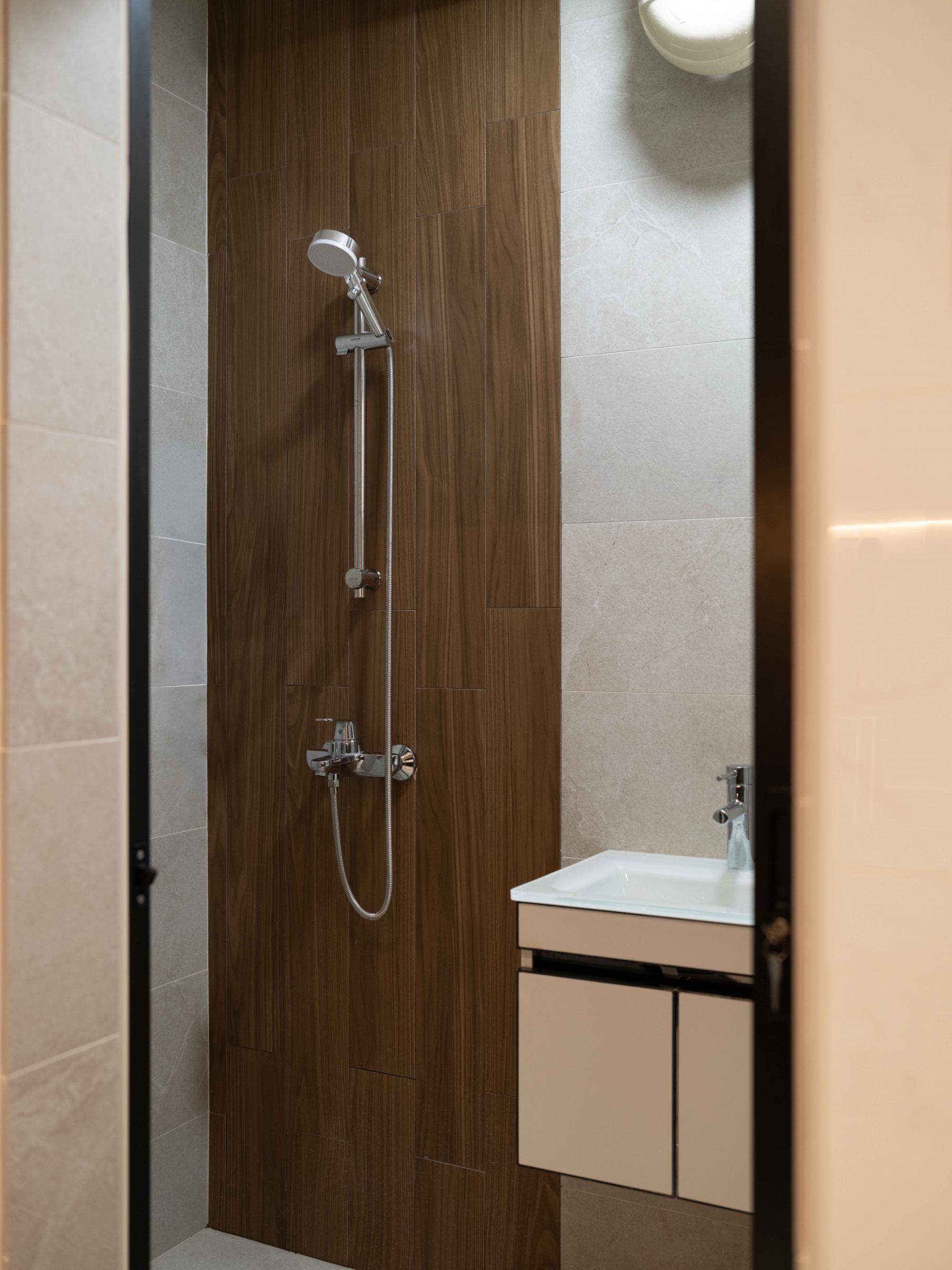 Scandinavian Bathroom with Mirror and Rainshower