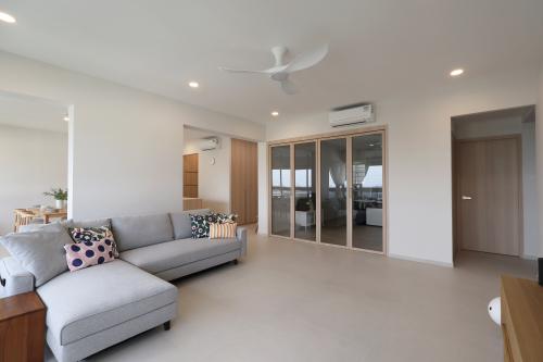 Minimalist Living Room at Resale 3 Bedroom Condo @ Mount Sinai Drive