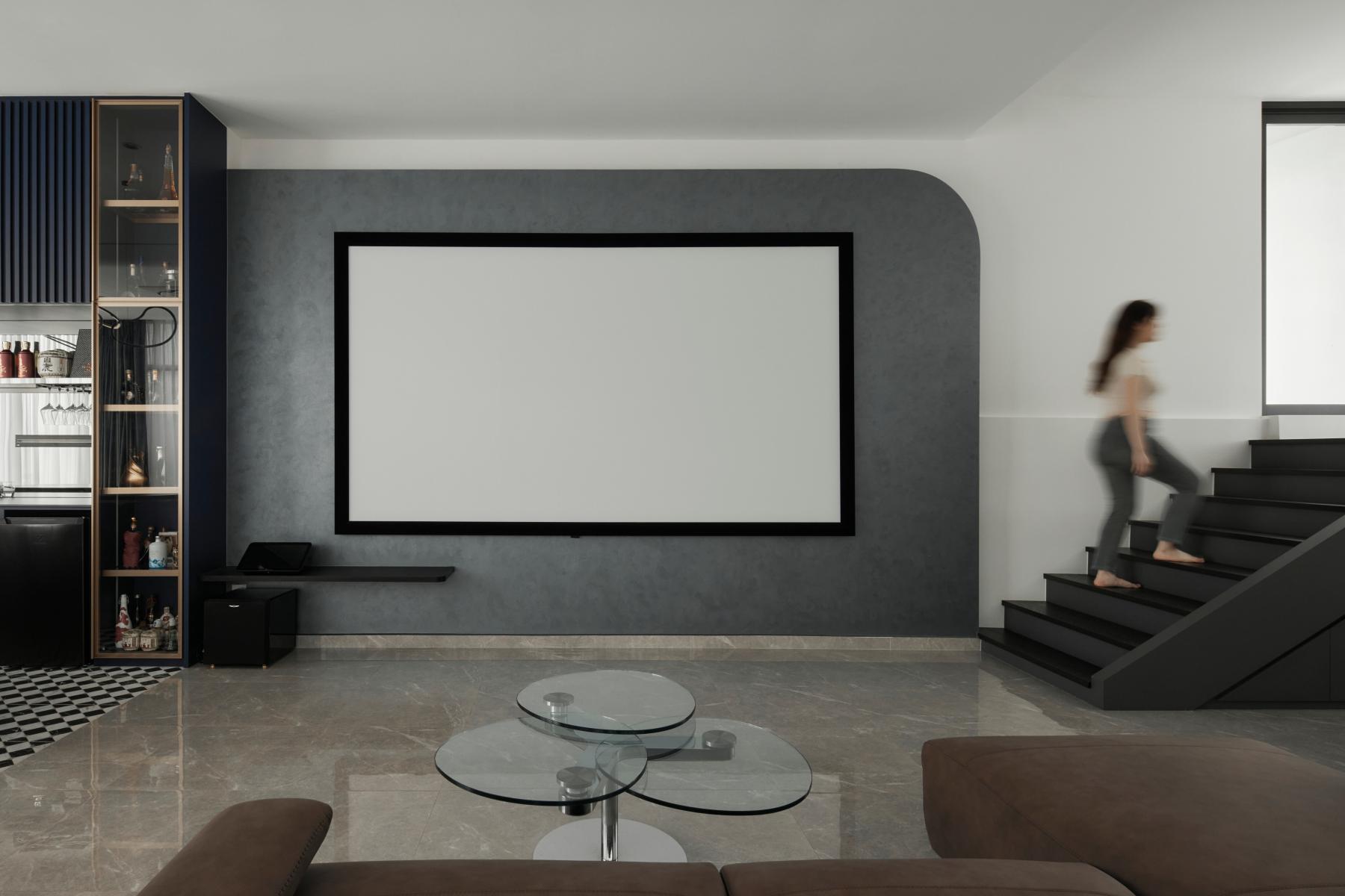 Asian Living Room with Granite Floor and TV Console