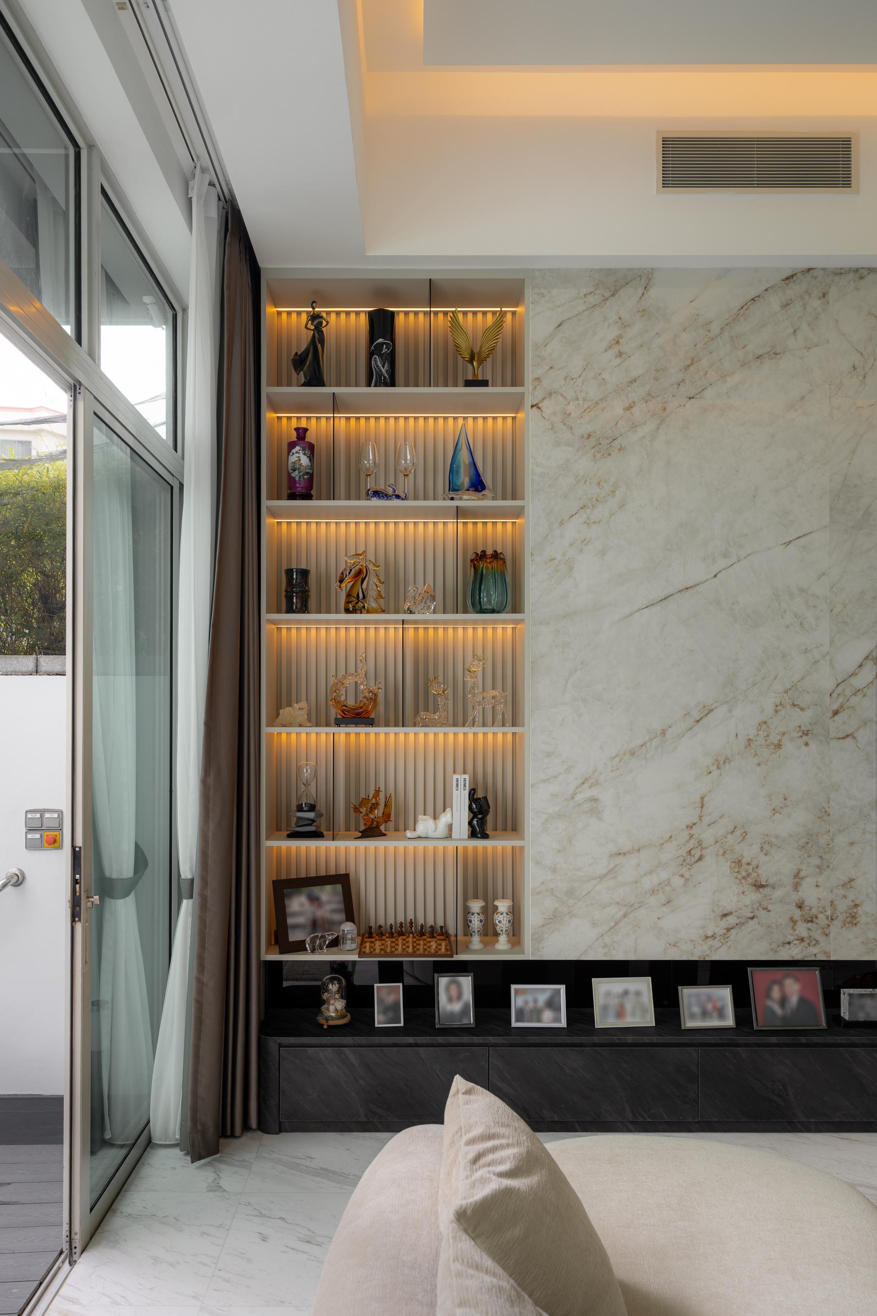 Contemporary Living Room with Bookshelf and Feature Wall