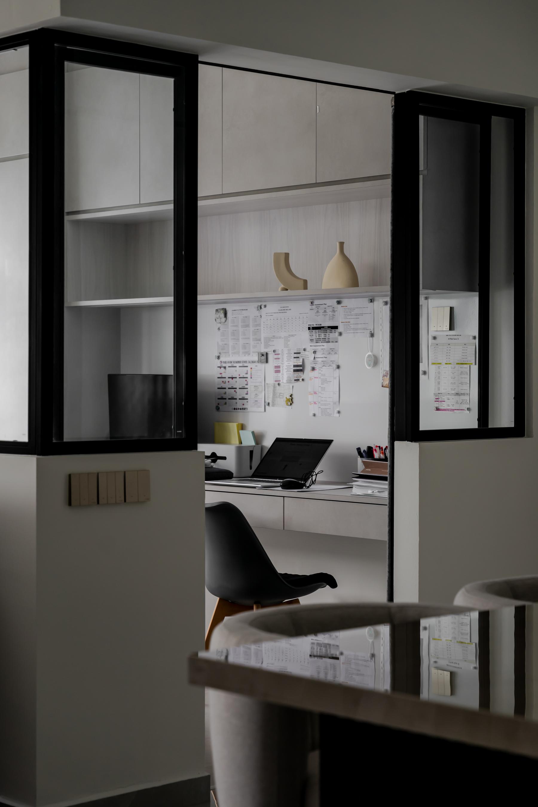 Contemporary Home Office with Bookshelf and Desk