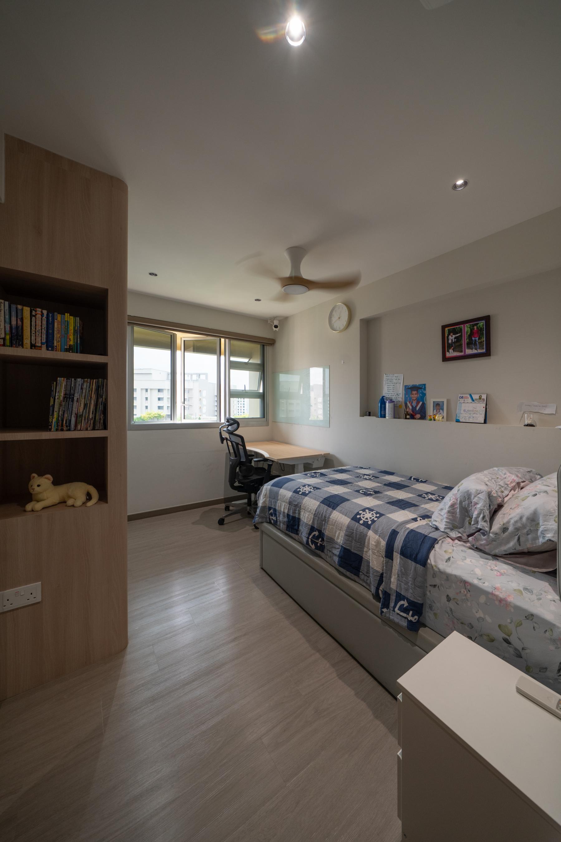 Contemporary Bedroom with Wood Flooring and Roller Blinds