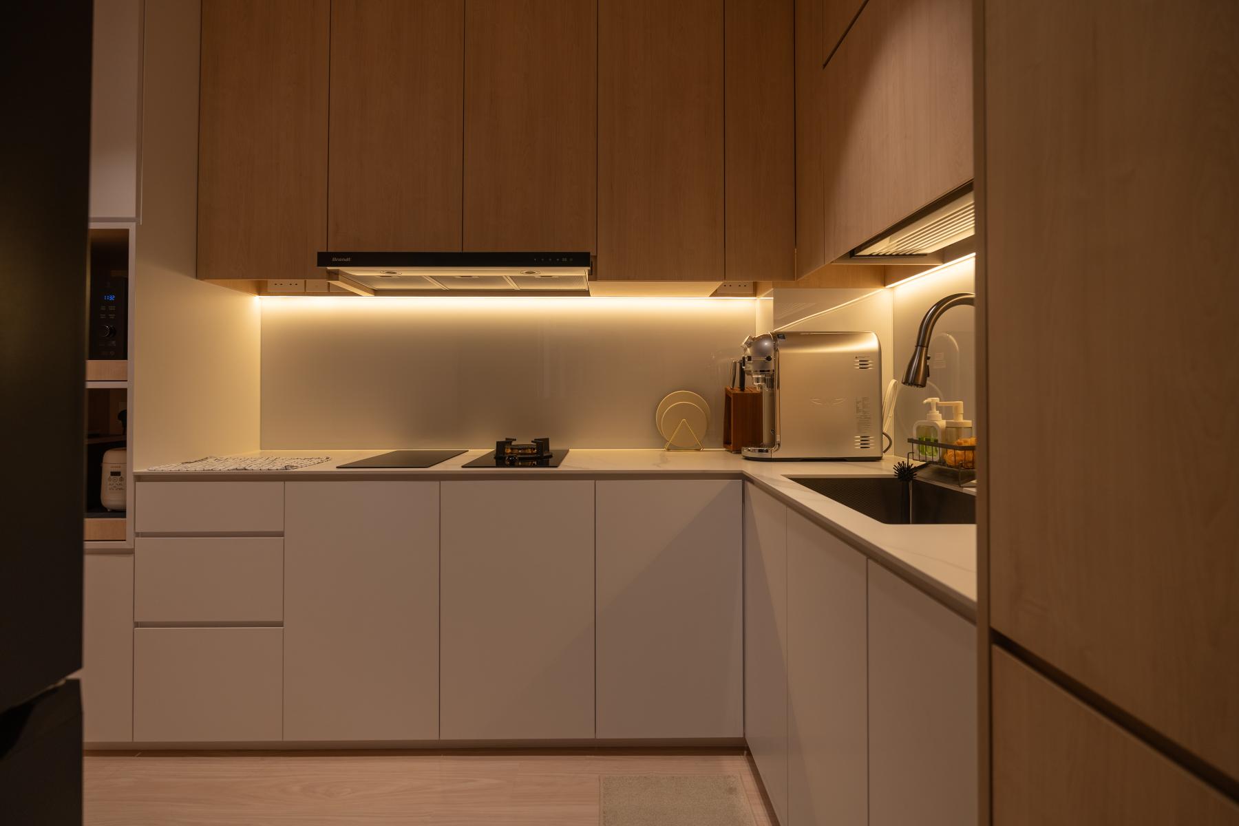 Contemporary Kitchen with Herringbone Tiling and Wood Flooring