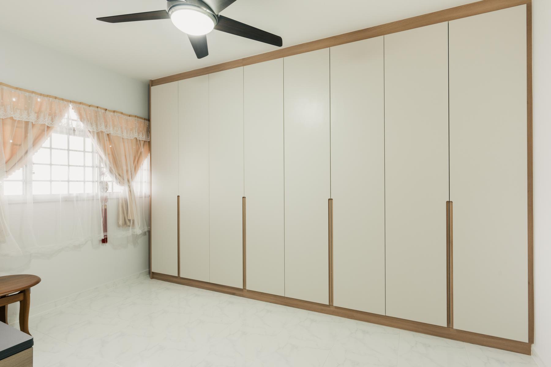 Contemporary Bedroom with Homogeneous Tiles and Wardrobe