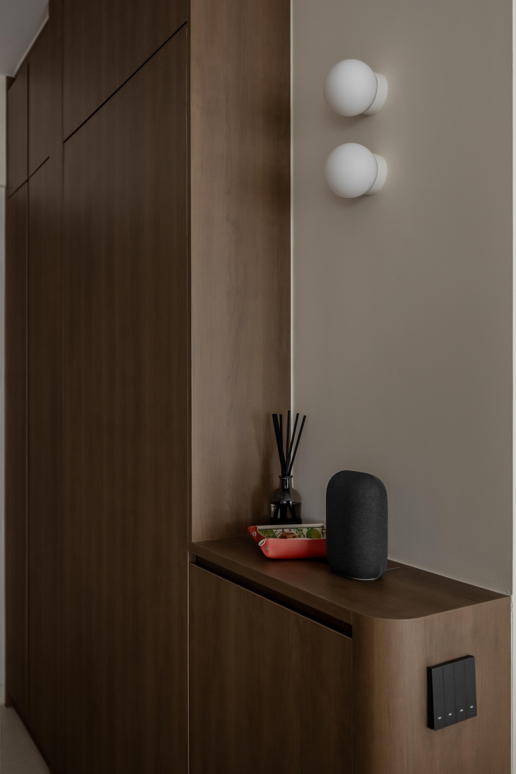 Minimalist Foyer with Console Table and Display Cabinets