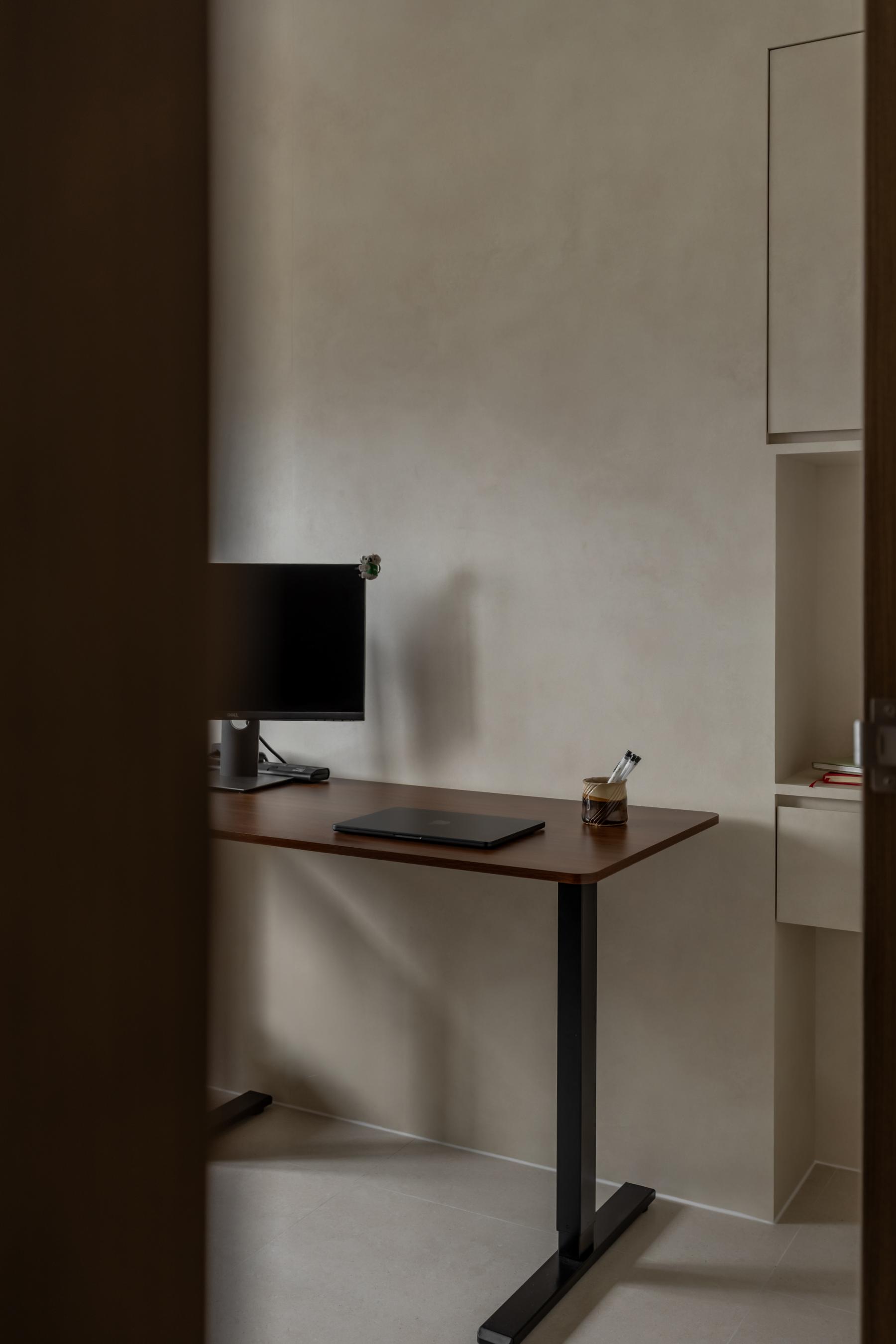 Minimalist Study with Bookshelf and Desk