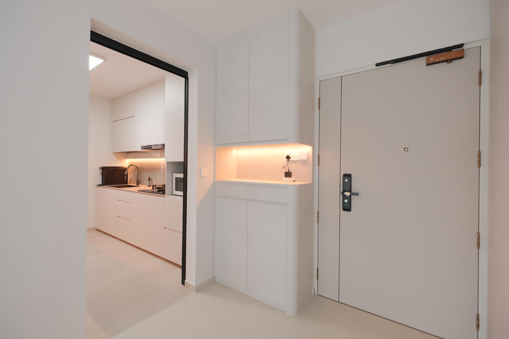 Minimalist Foyer with Artwork and Shoe Rack