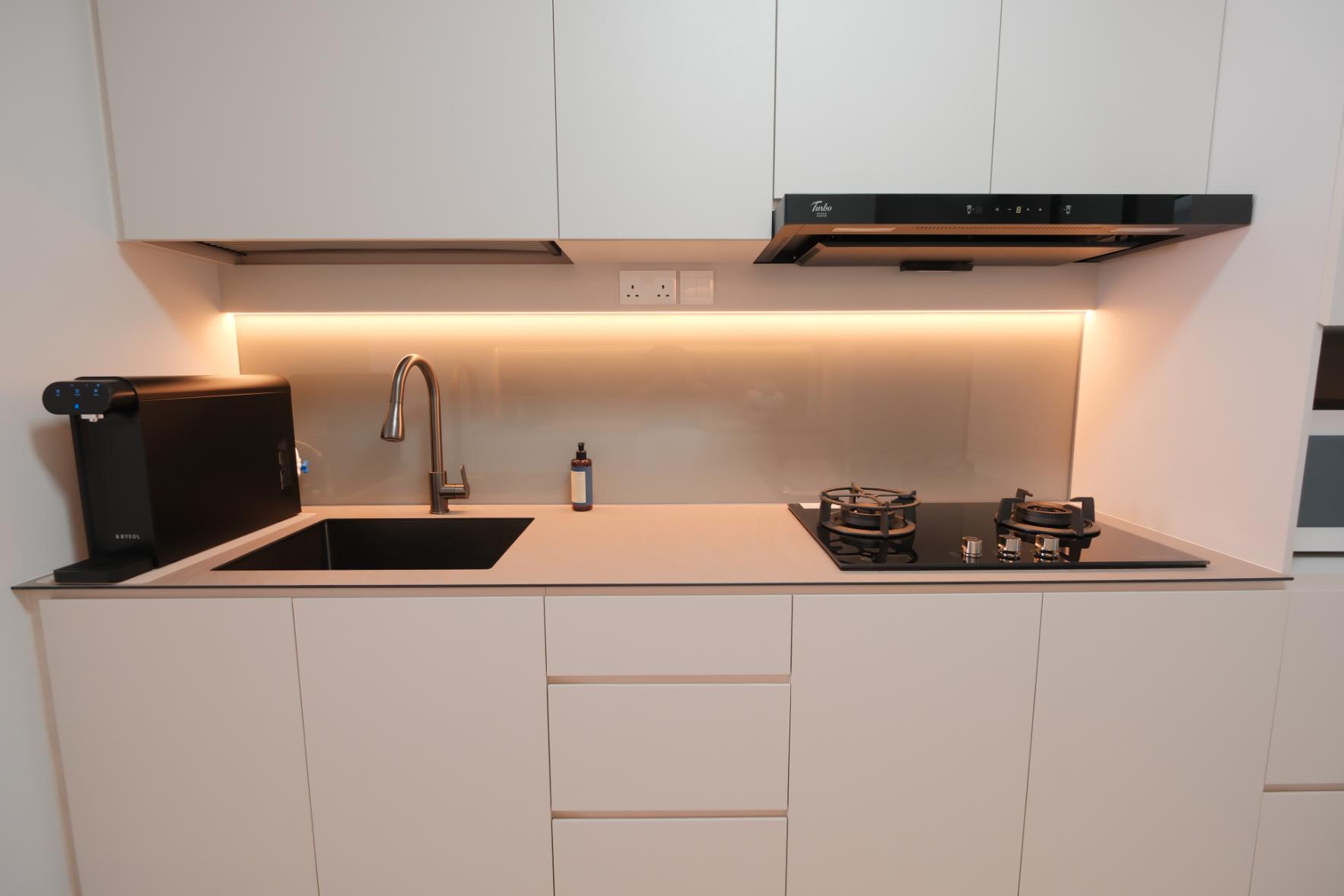 Minimalist Kitchen with Countertop and Homogeneous Tiles