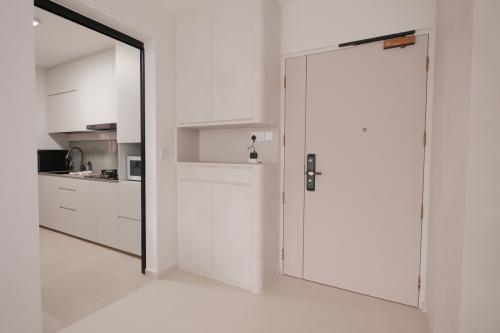 Minimalist Foyer at 617D Punggol Dr