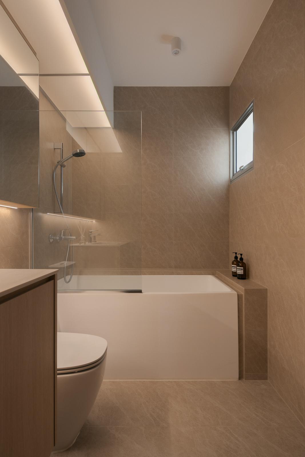 Asian Bathroom with Mirror and Bathtub