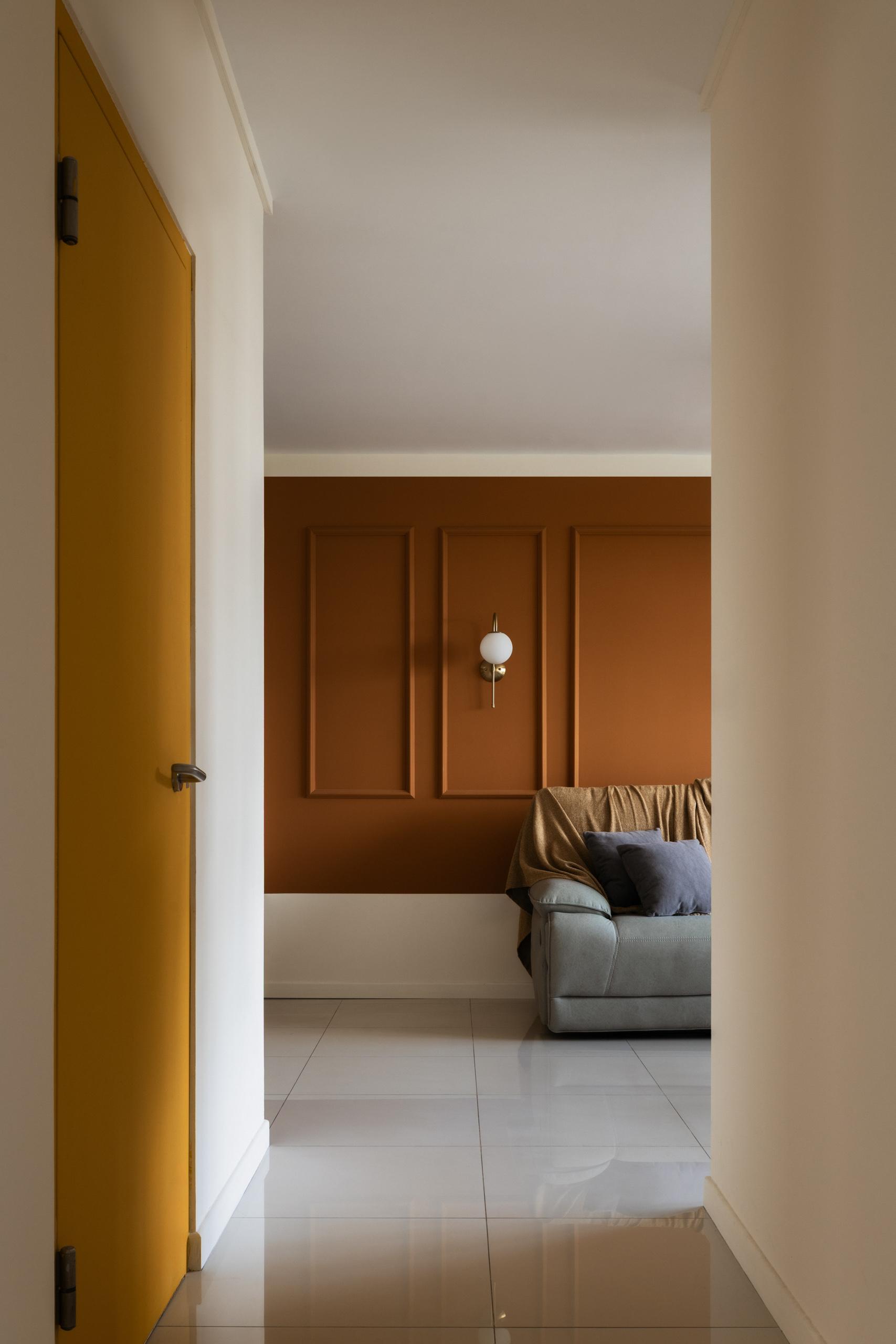Eclectic Hallway with Homogeneous Tiles and Feature Wall