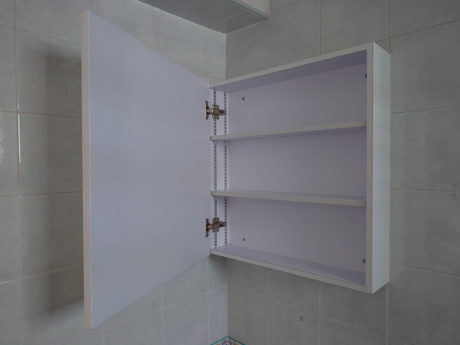 Asian Bathroom with Mirror and Bathroom Storage