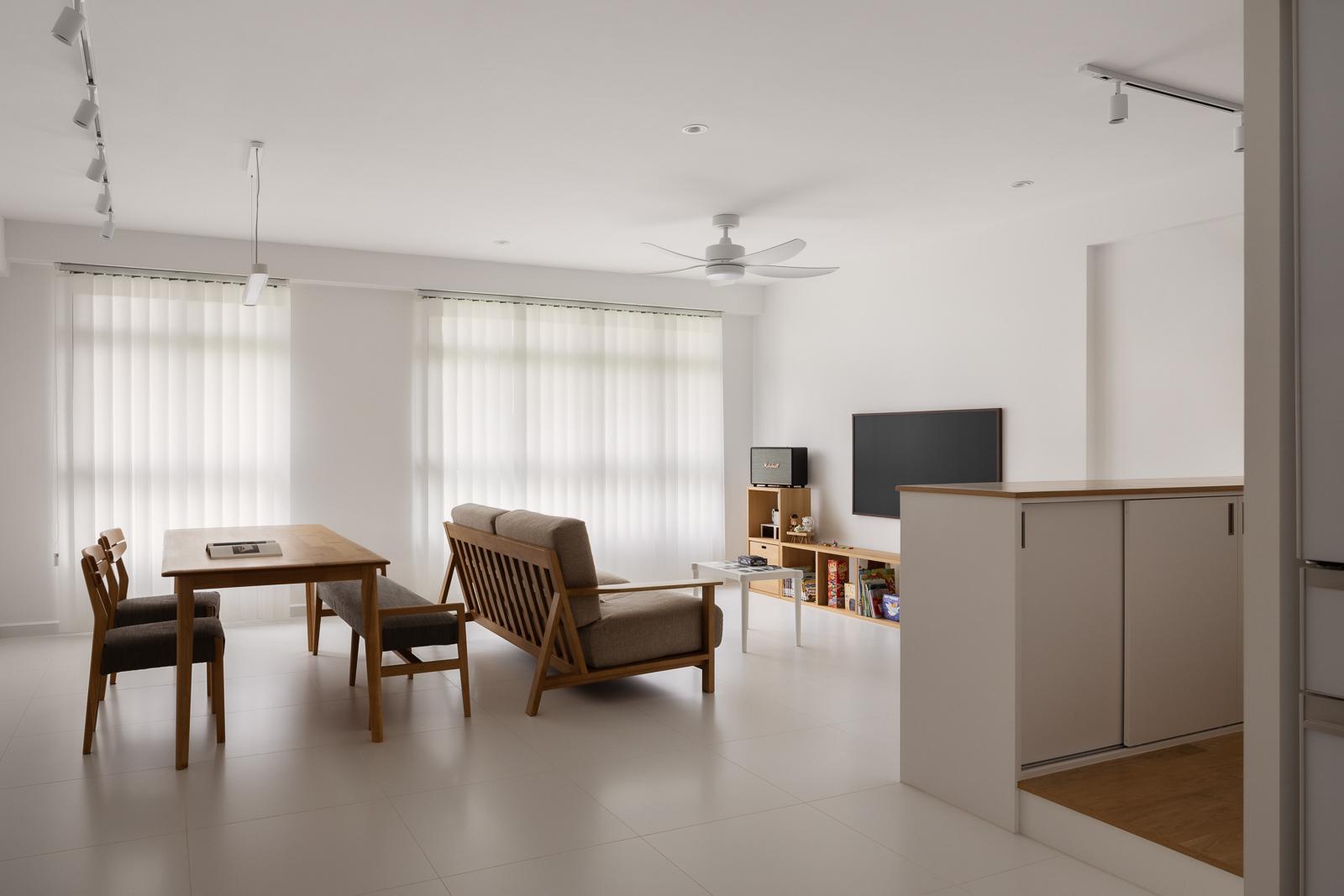 Minimalist Living Room with Homogeneous Tiles and Curtain