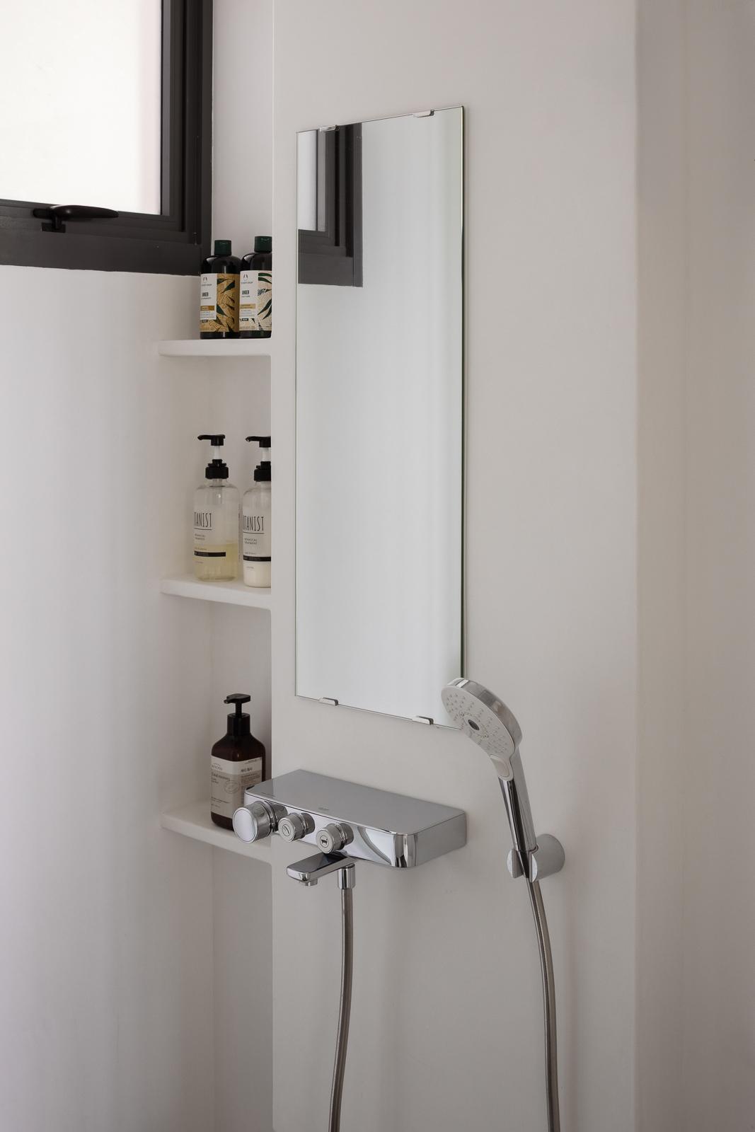 Minimalist Bathroom with Mirror and Bathroom Storage