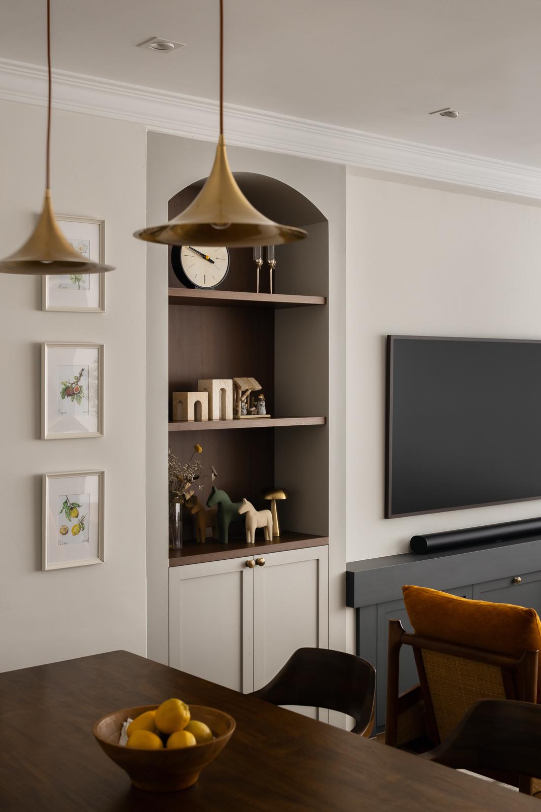 Country Living Room with Bookshelf and Dining Table