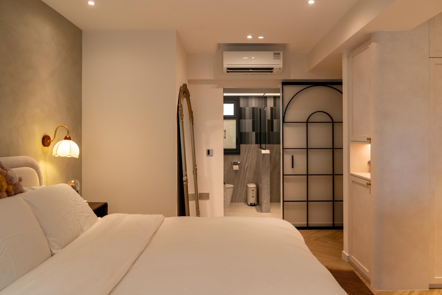 Country Bedroom with Herringbone Tiling and Feature Wall