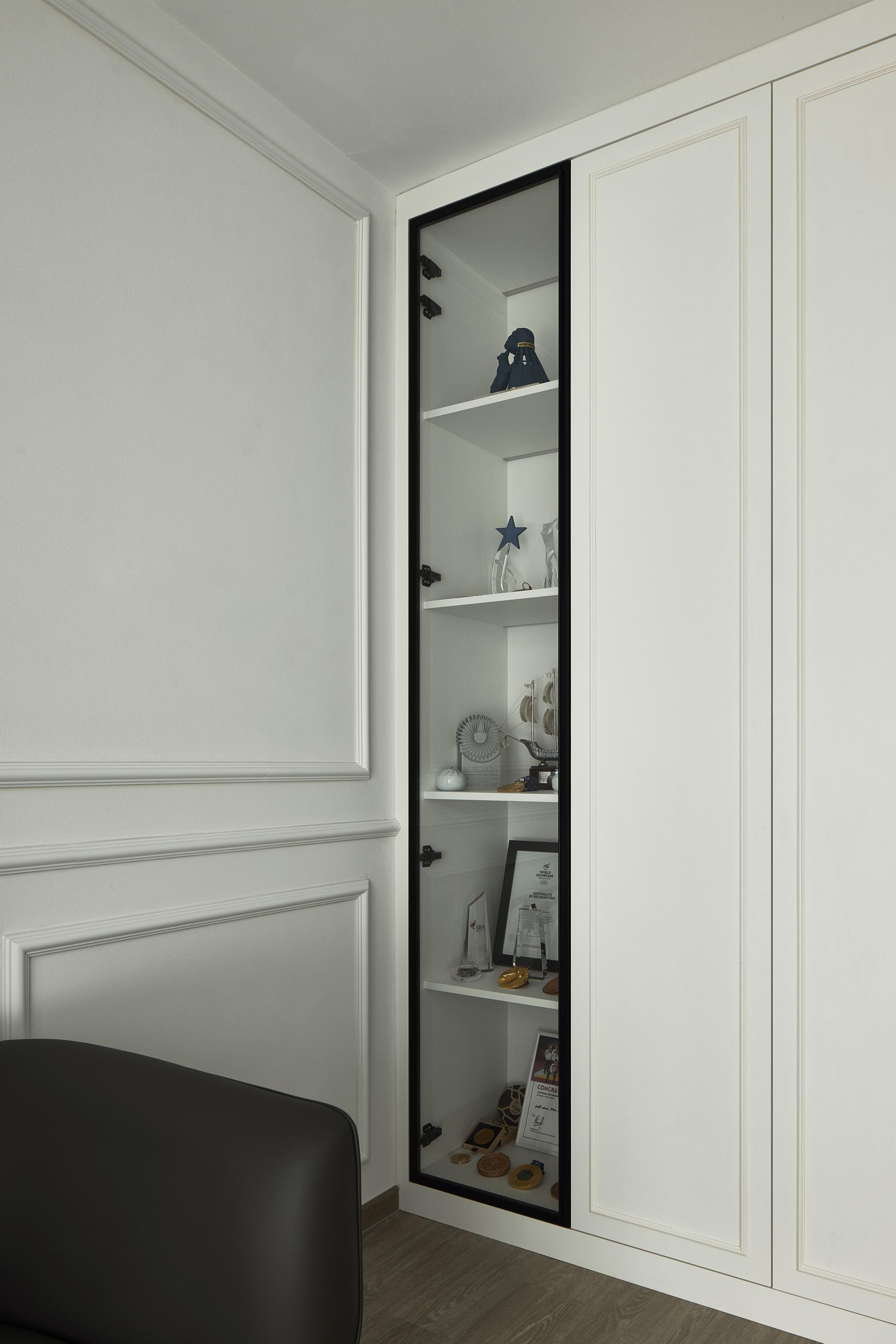 Asian Living Room with Wood Flooring and Display Cabinets