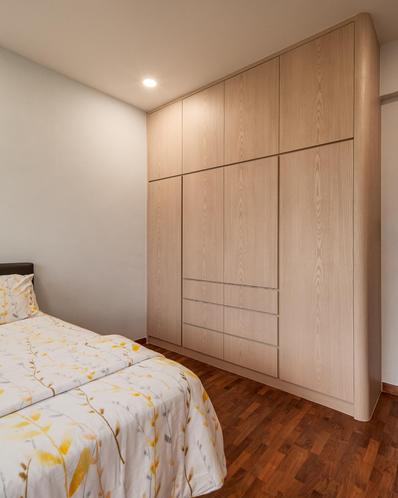 Country Bedroom with Wood Flooring and Drop Ceiling