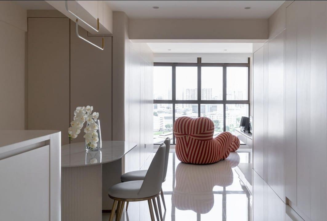 Contemporary Dining Room with Drop Light and Downlights
