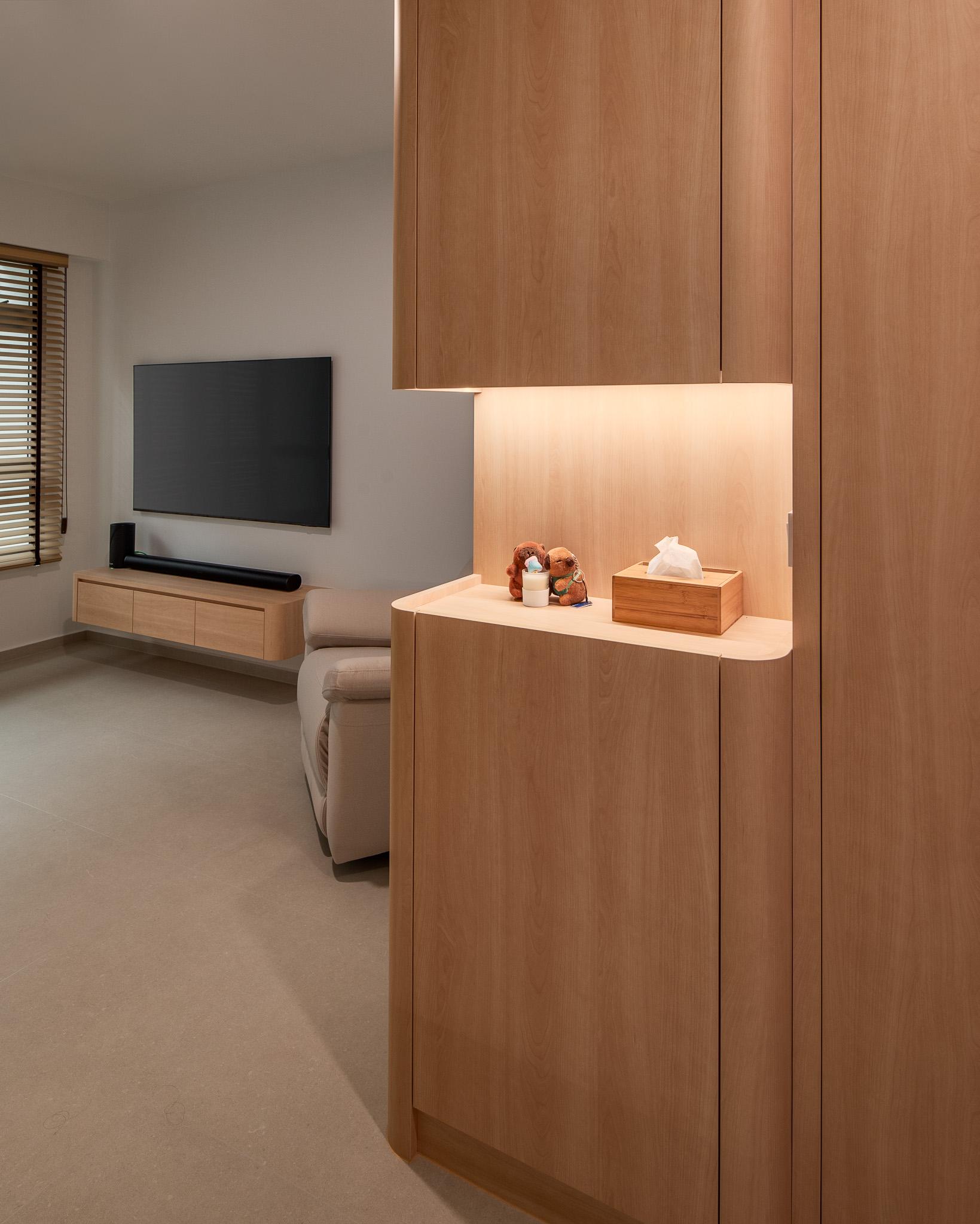 Scandinavian Foyer with Cove Lighting and Artwork