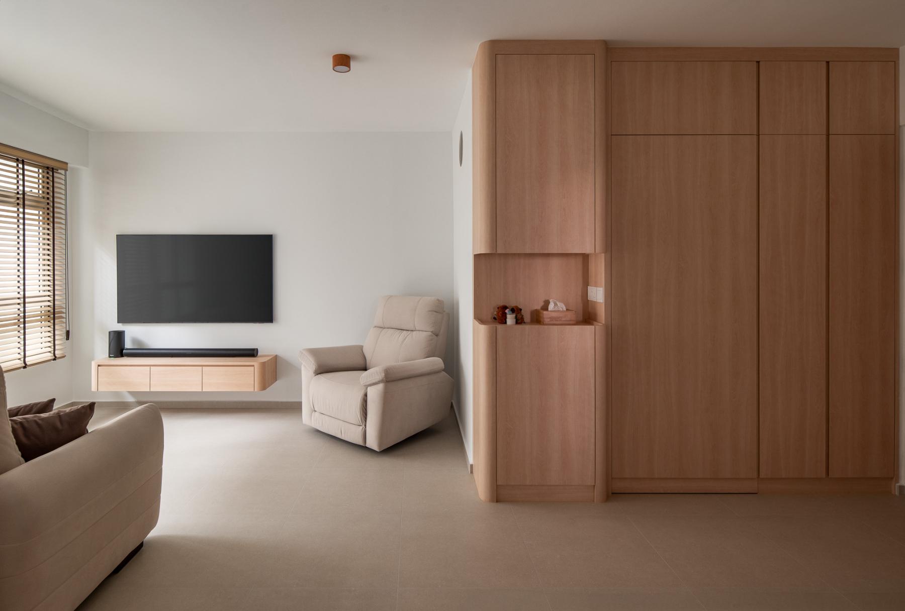Scandinavian Living Room with Homogeneous Tiles and TV Console