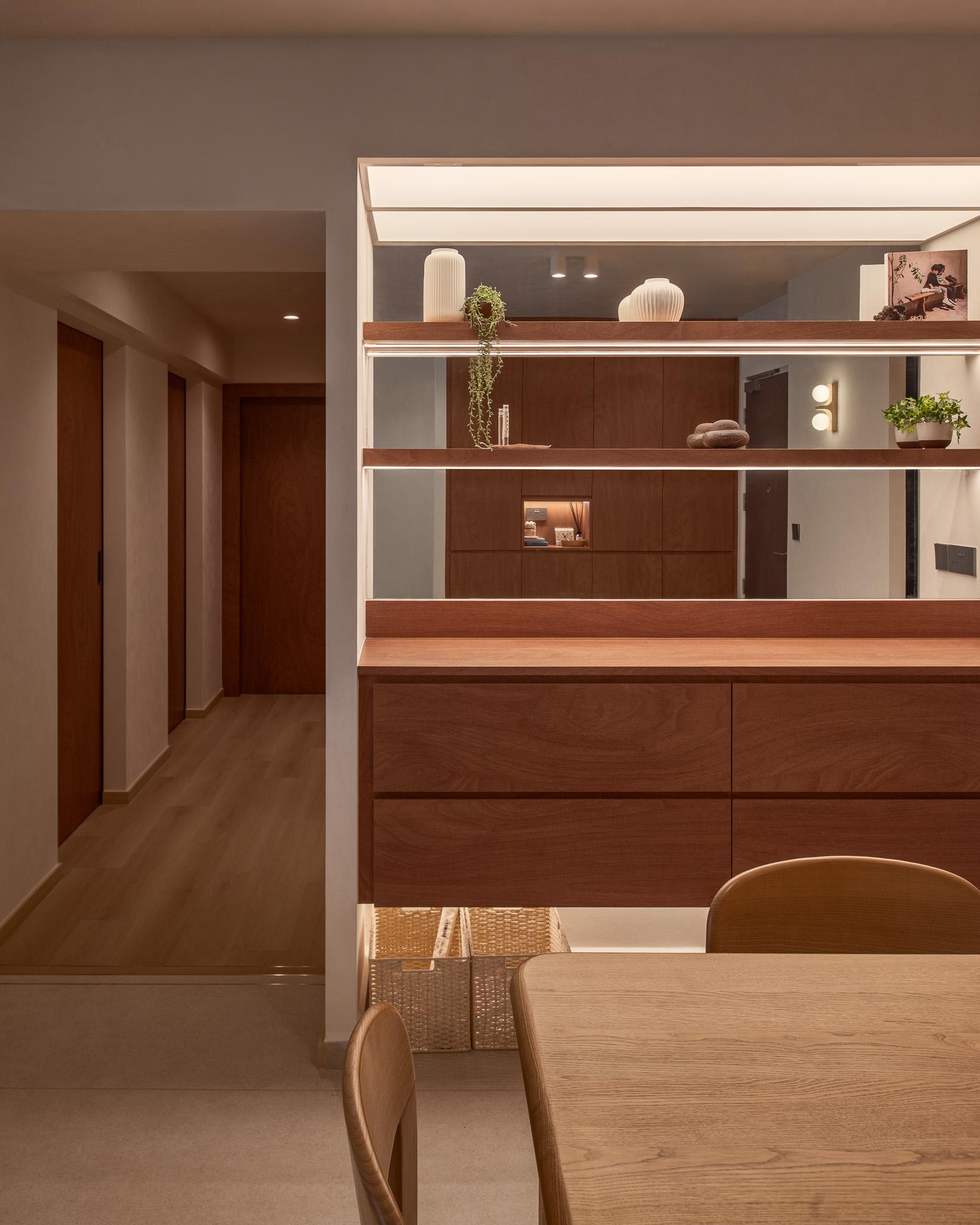 Scandinavian Dining Room with Mirror and Cove Lighting