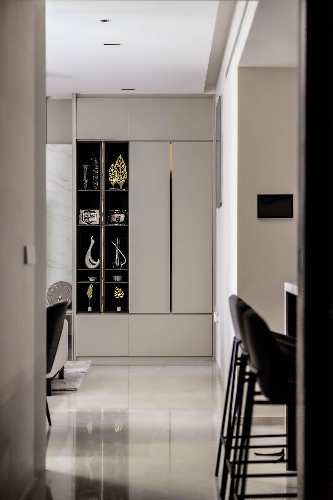 Modern Hallway with Bookshelf and Artwork