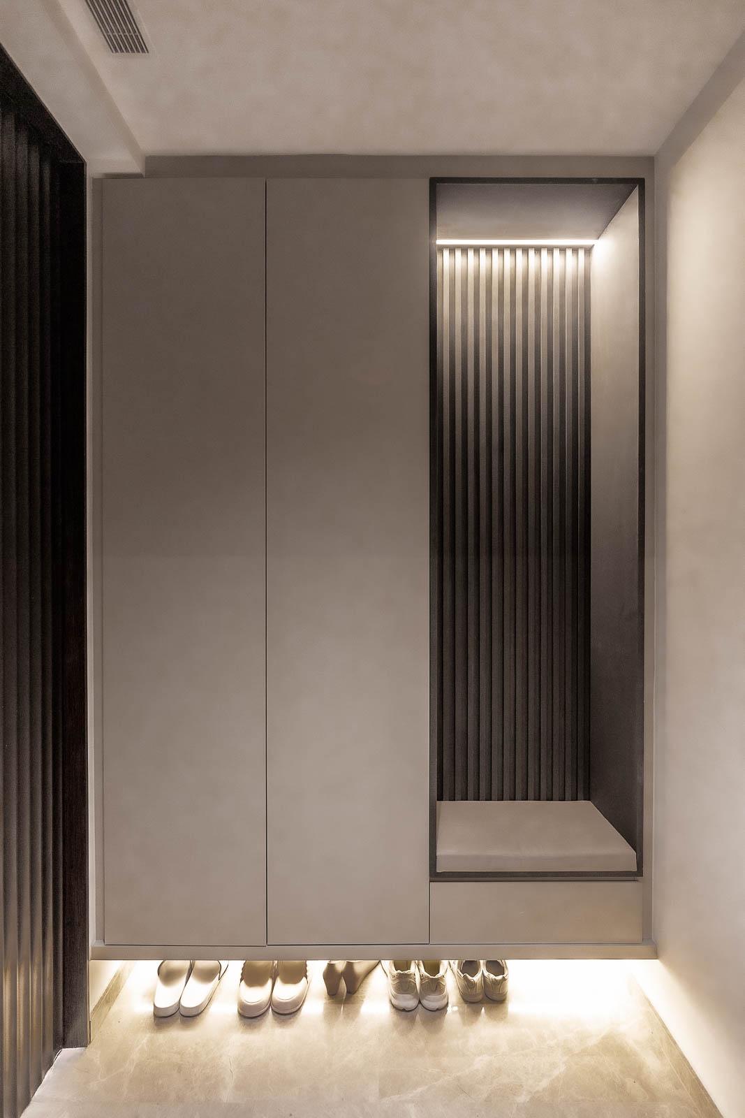 Modern Entryway with Cove Lighting and Seating Bench