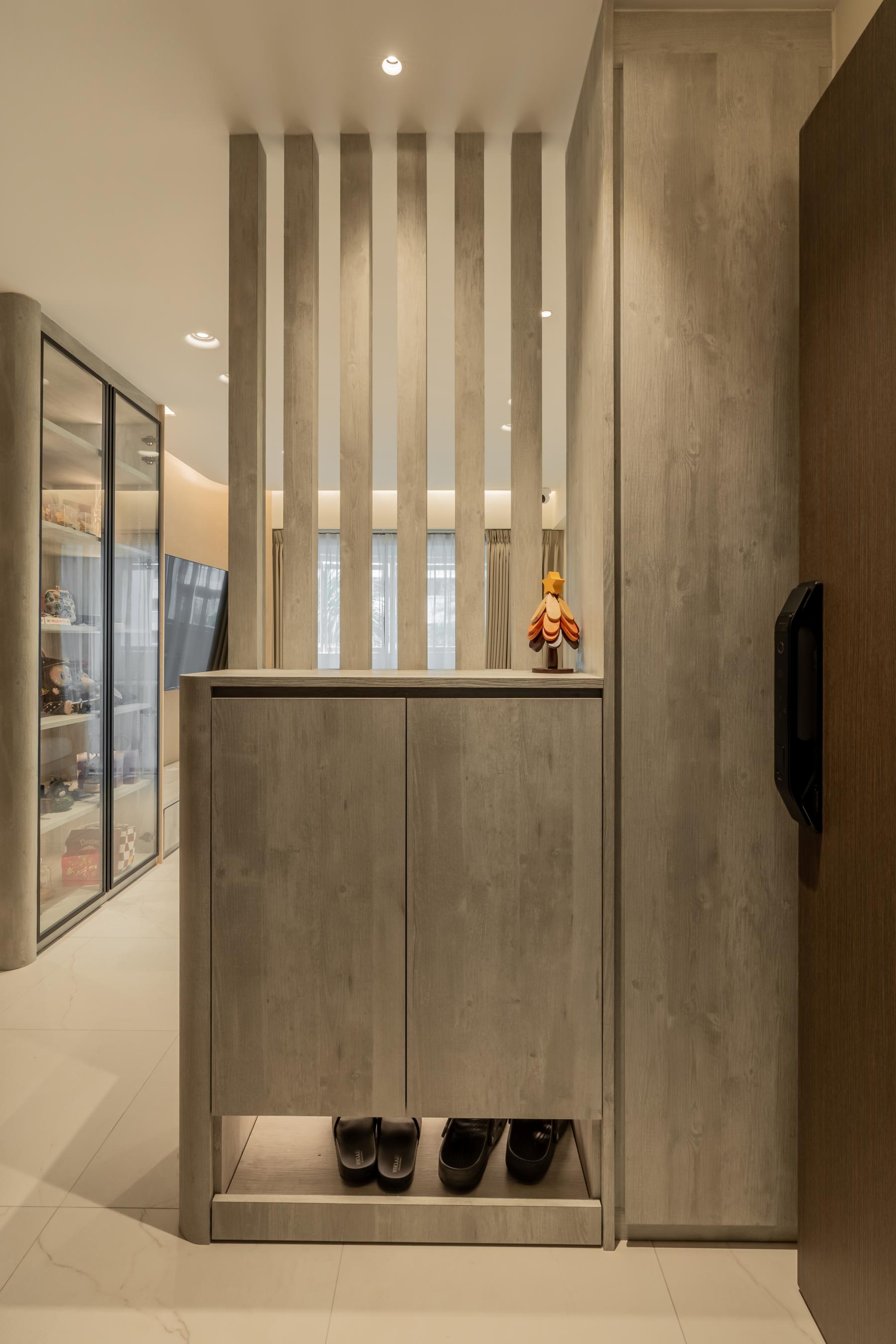 Contemporary Foyer with Homogeneous Tiles and Display Cabinets