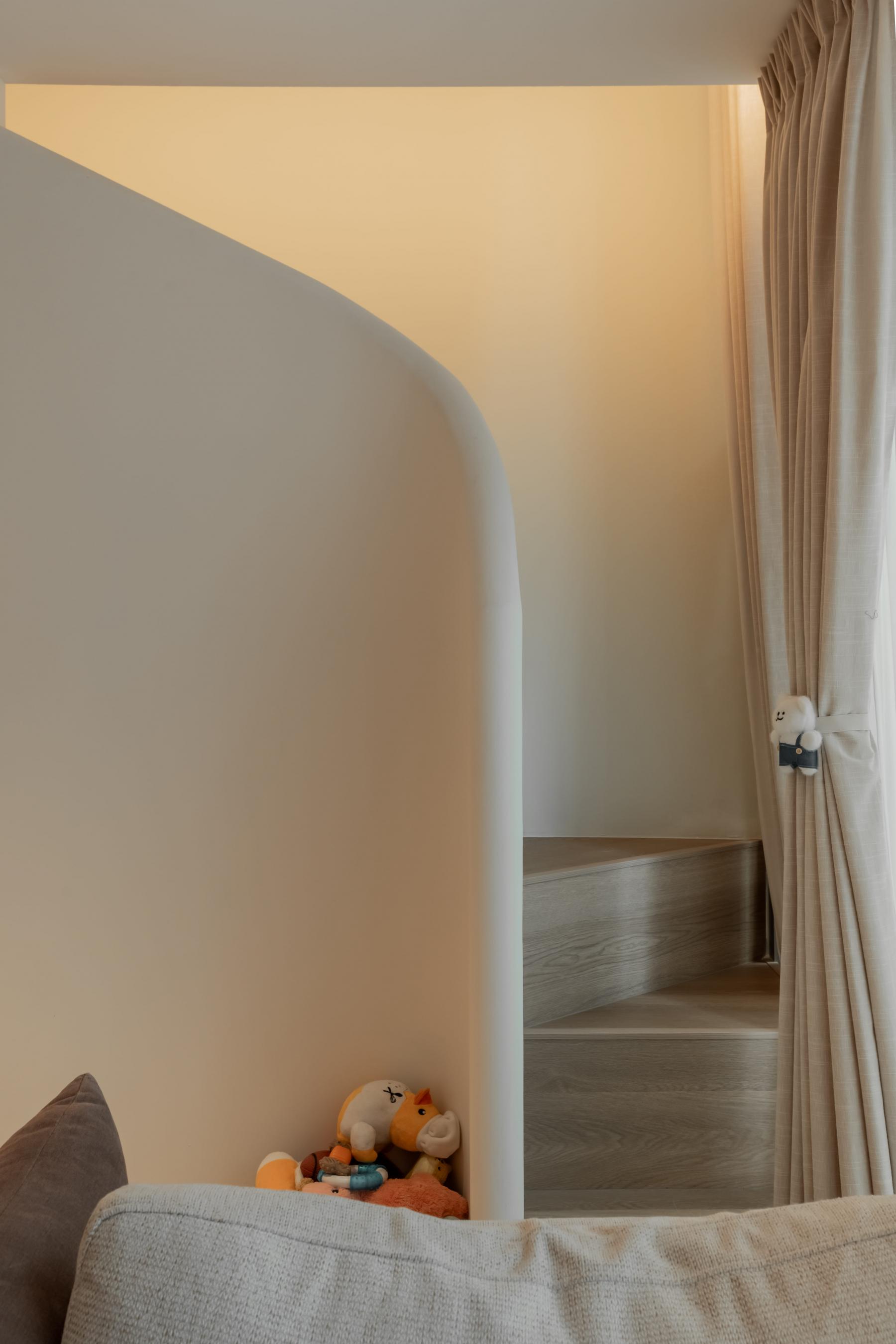 Minimalist Entryway with Mirror and Staircase