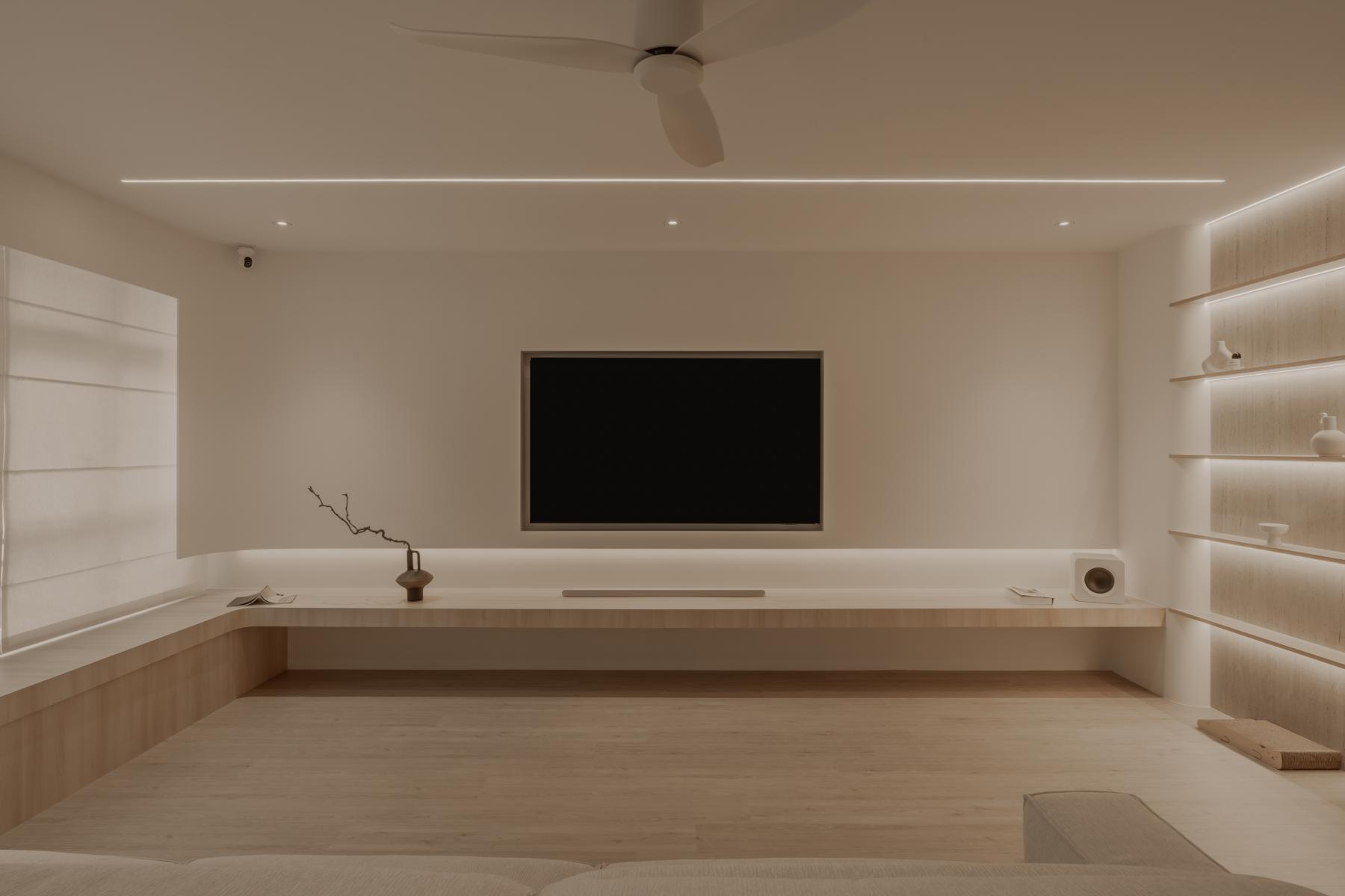 Minimalist Living Room with TV Console and Cove Lighting