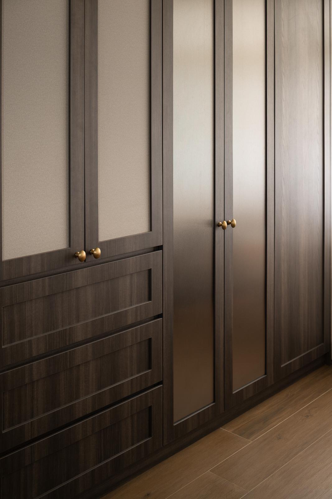 Contemporary Walk-in Wardrobe with Wood Flooring and Wardrobe