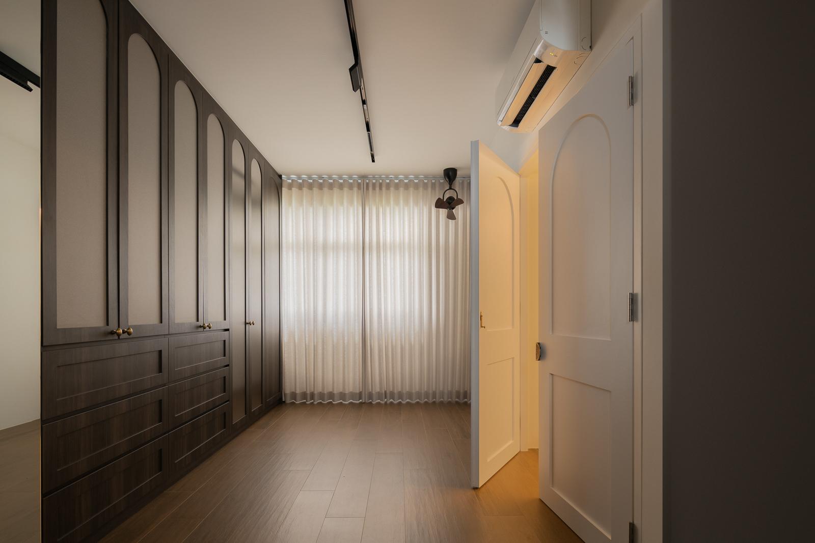 Contemporary Walk-in Wardrobe with Wood Flooring and Wardrobe