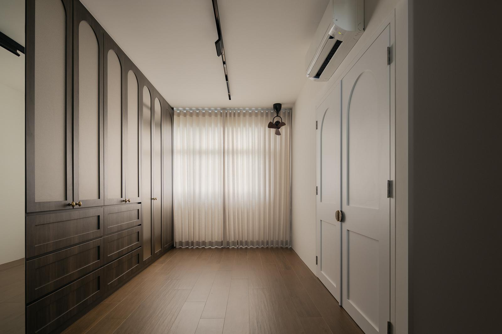 Contemporary Walk-in Wardrobe with Wood Flooring and Mirror