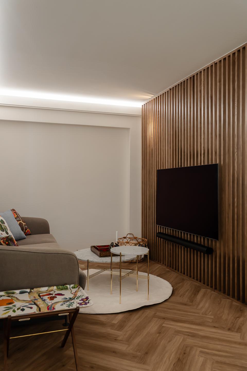 Modern Living Room with Vinyl Flooring and Feature Wall