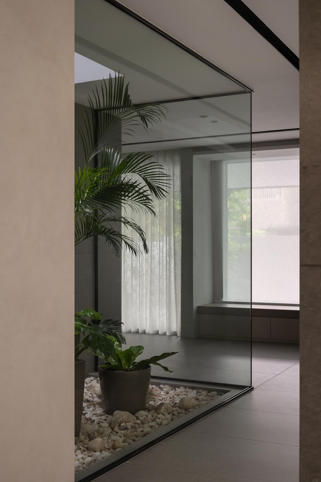 Contemporary Hallway with Feature Wall and Glass Door