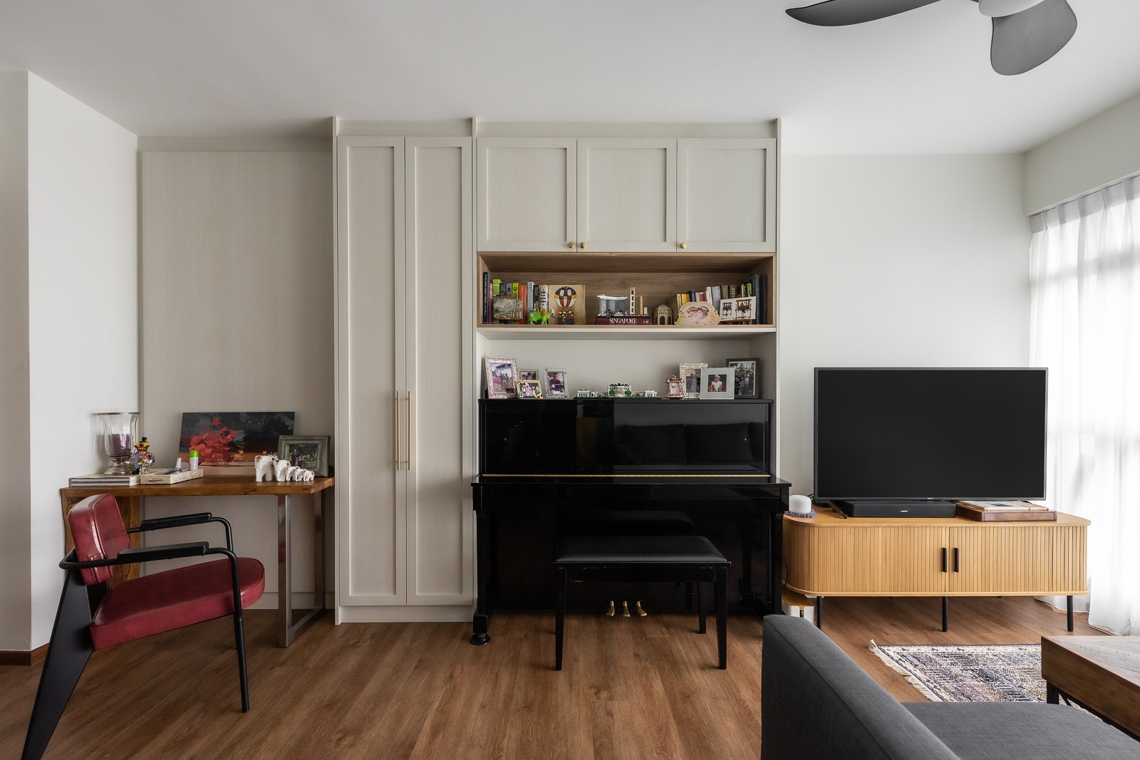Contemporary Living Room with Bookshelf and Vinyl Flooring