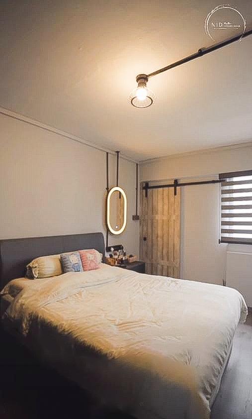 Scandinavian Bedroom with Flooring and Bed