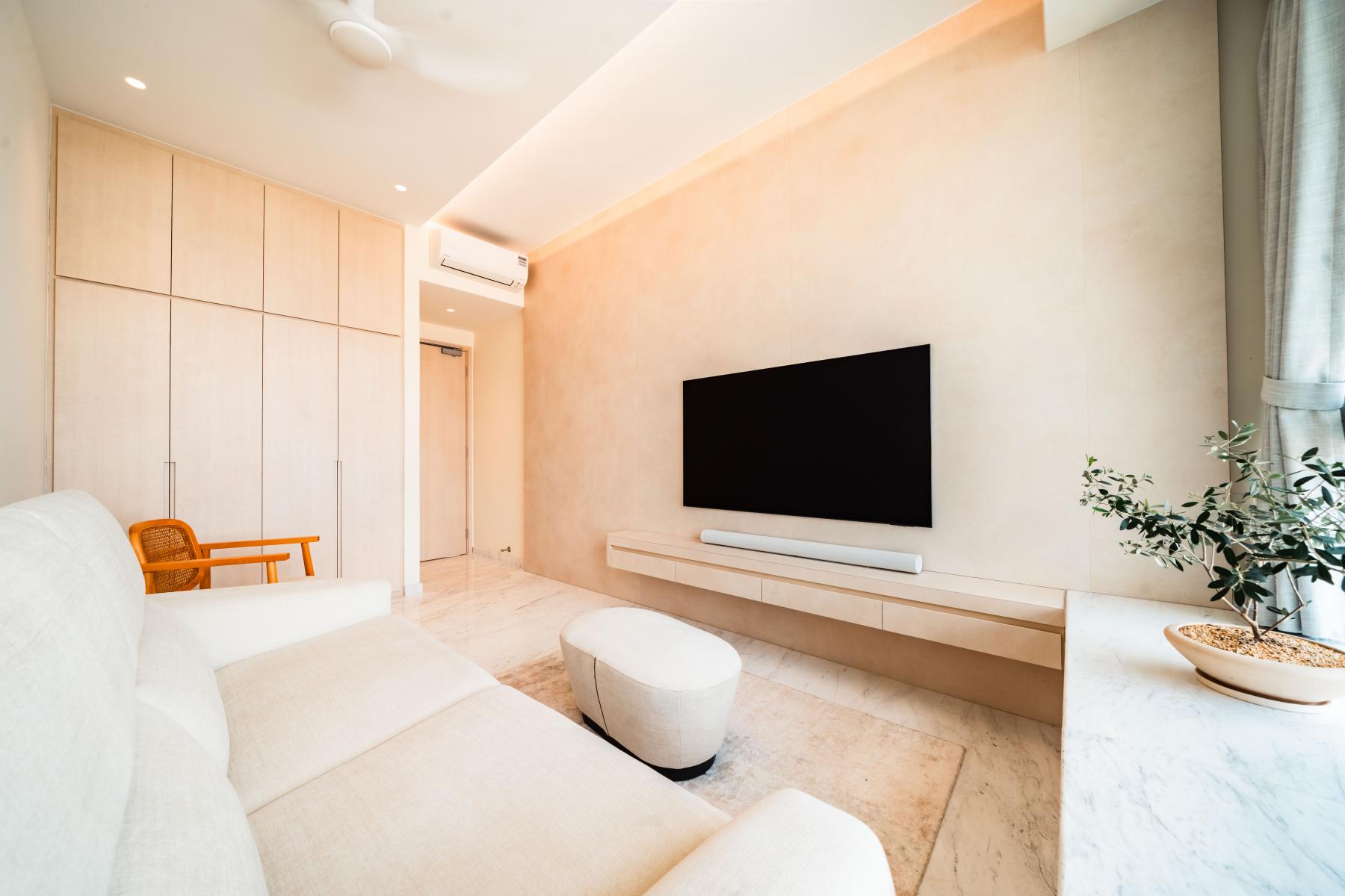 Minimalist Living Room with Cove Lighting and Sofa
