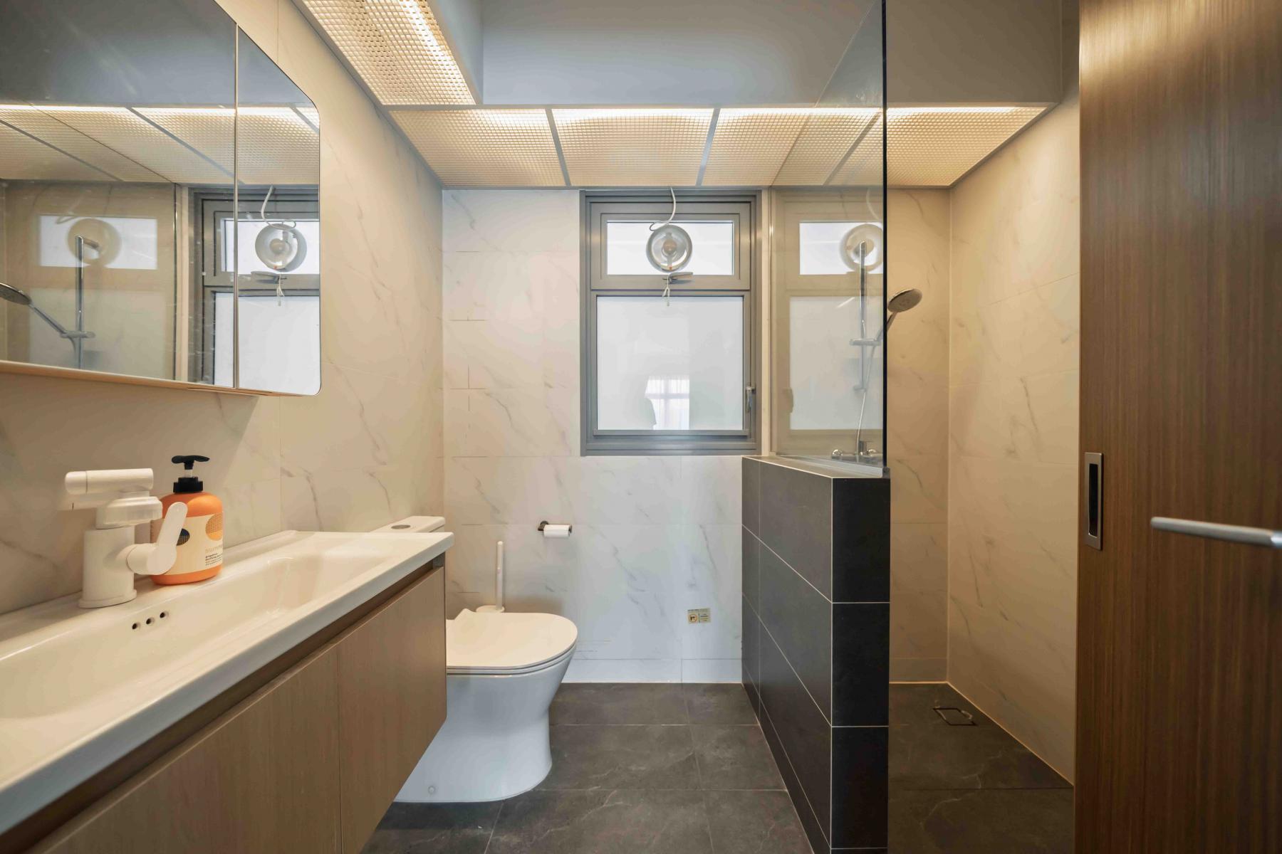 Minimalist Bathroom with Countertop and Mirror