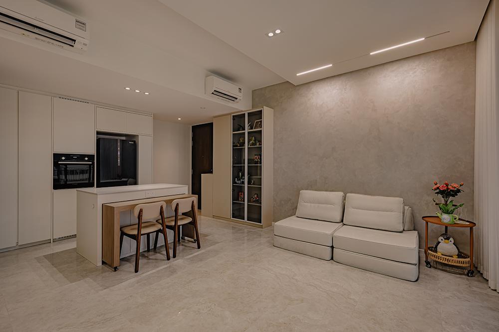 Minimalist Living Room with Kitchen Island and Paintings