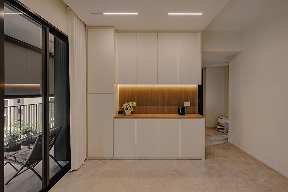 Minimalist Living Room with Storage Cabinets and Lighting