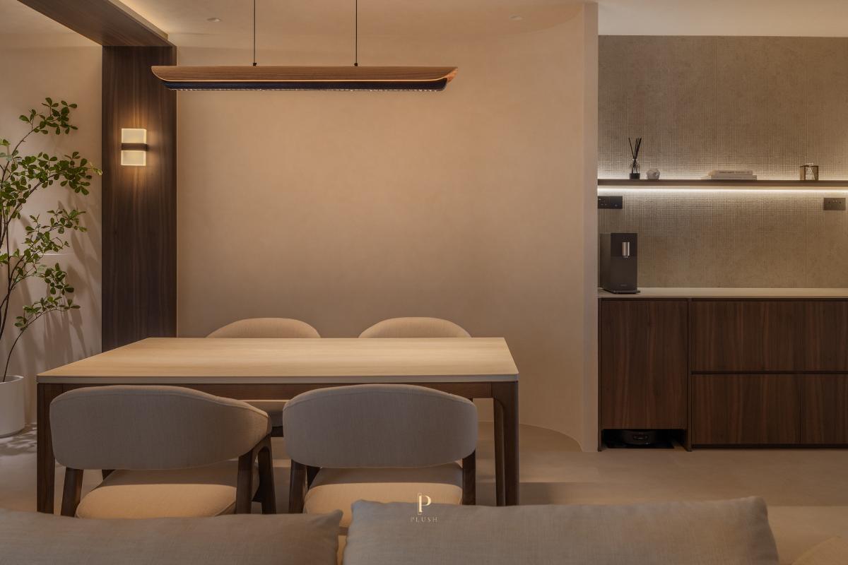 Minimalist Dining Room with Cove Lighting and Dining Table