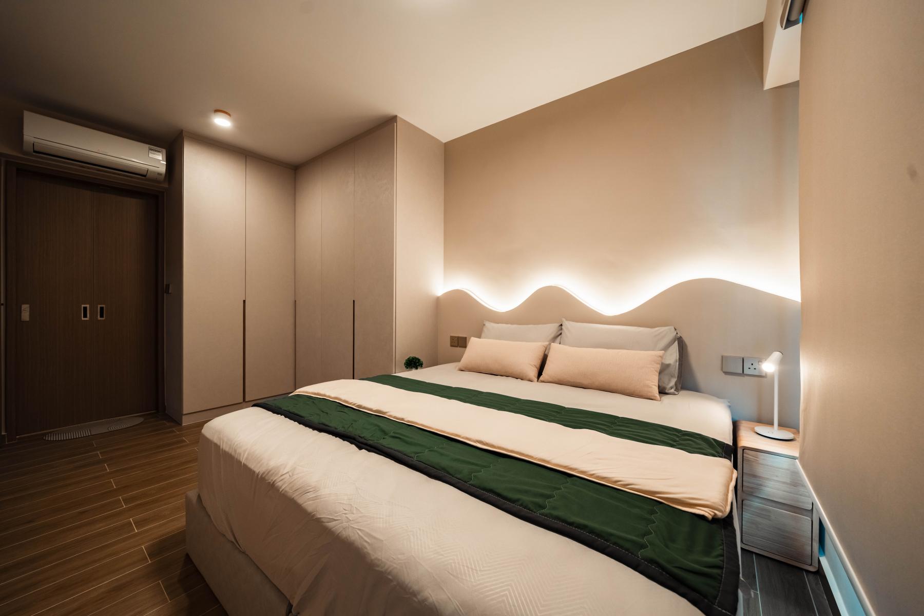 Modern Bedroom with Wood Flooring and Cove Lighting