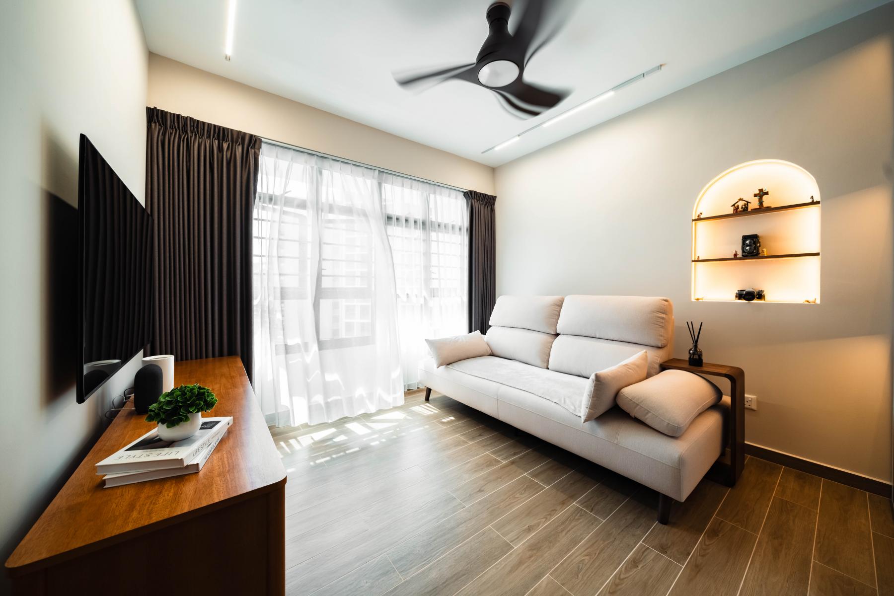 Modern Living Room with Cove Lighting and Ceiling Fan